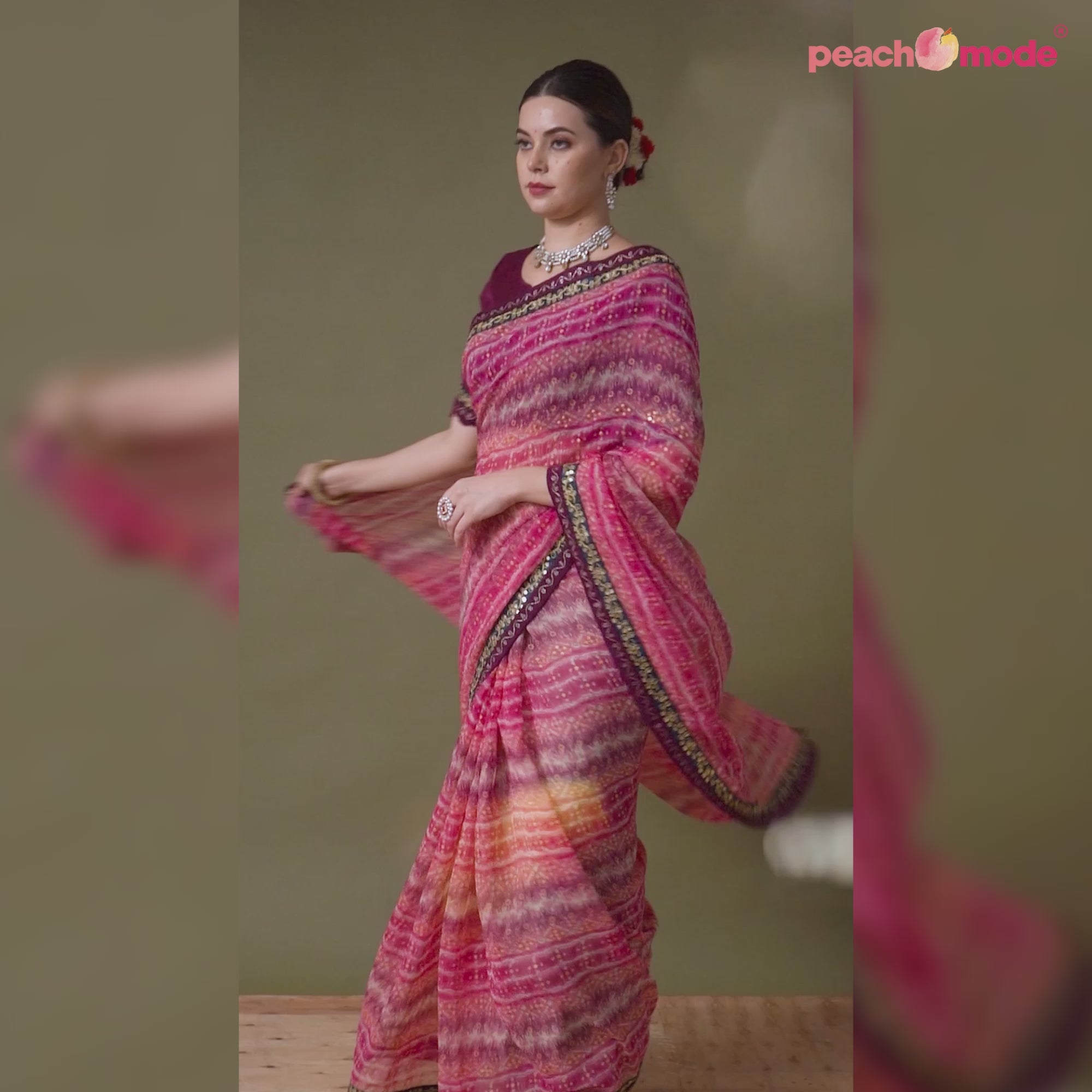 Pink Leheriya Printed Georgette Saree With Embroidered Border