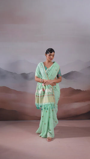 Trendy Sea Green Cotton Blend Weaving Saree Showcasing Floral & Animal Motif & Classic Tassel Pallu