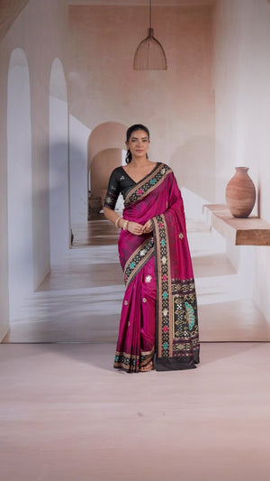 Magenta Art Silk Saree Adorned with Intricate Patola Style Woven Designs