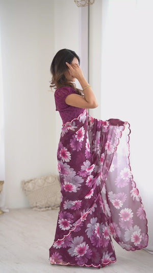 Purple Georgette Saree Featuring Floral Prints & Shimmering Mirror Work Border