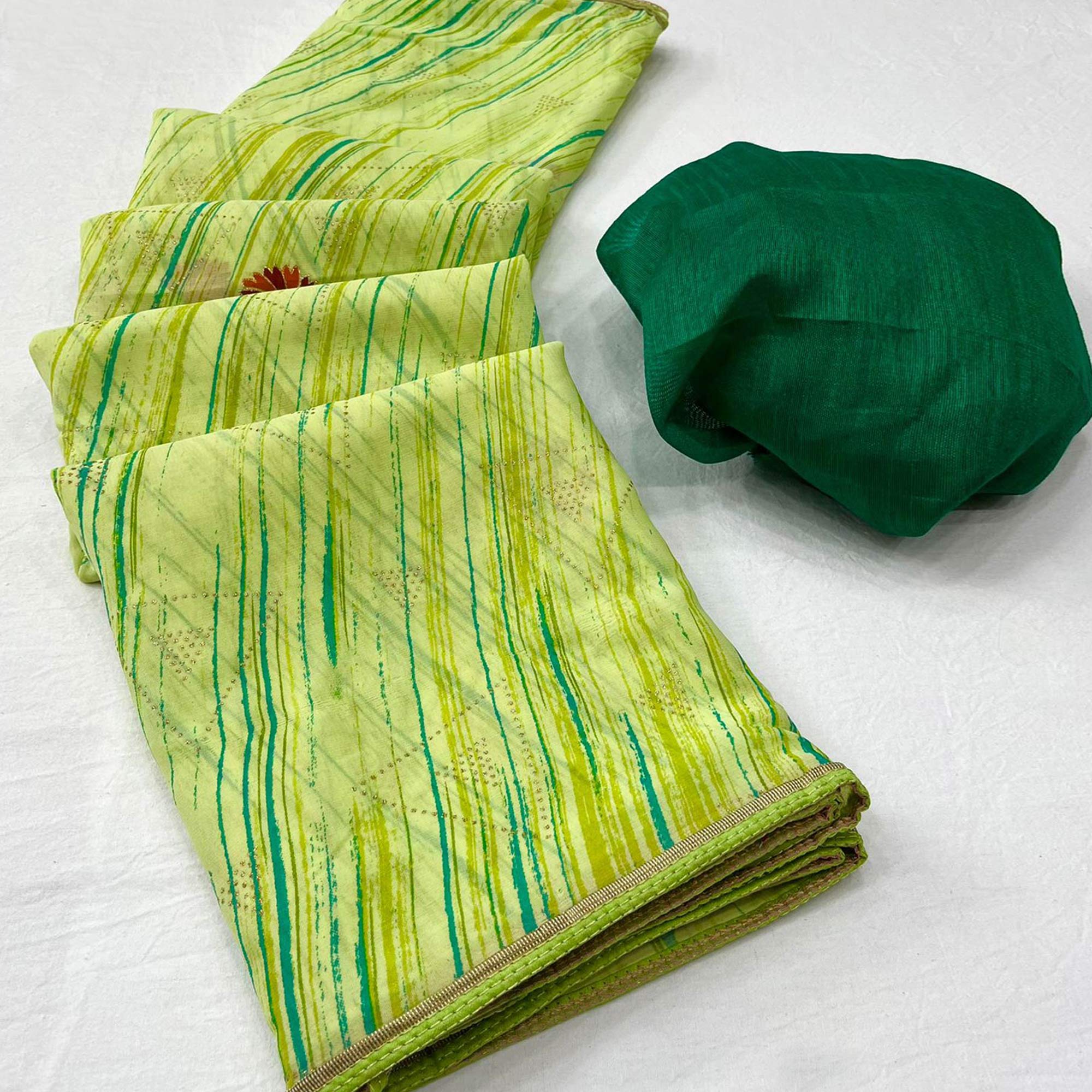 Green Printed Raw Silk Saree With Fancy Border