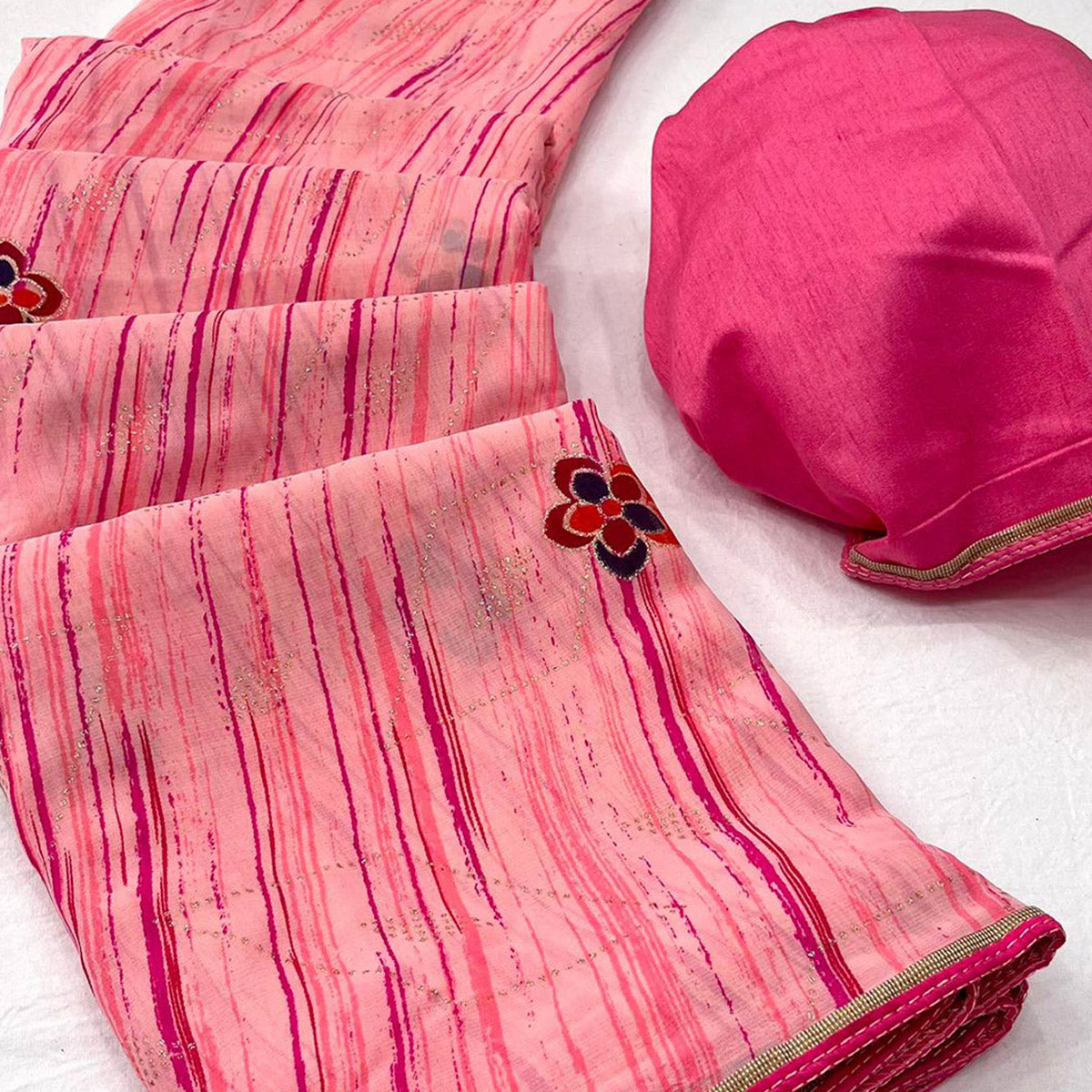 Peach Printed Raw Silk Saree With Fancy Border