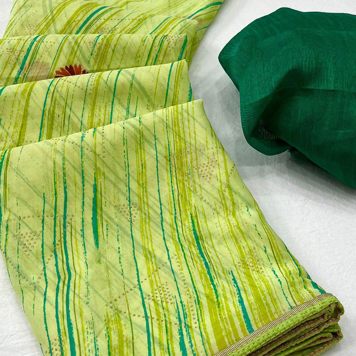 Green Printed Raw Silk Saree With Fancy Border