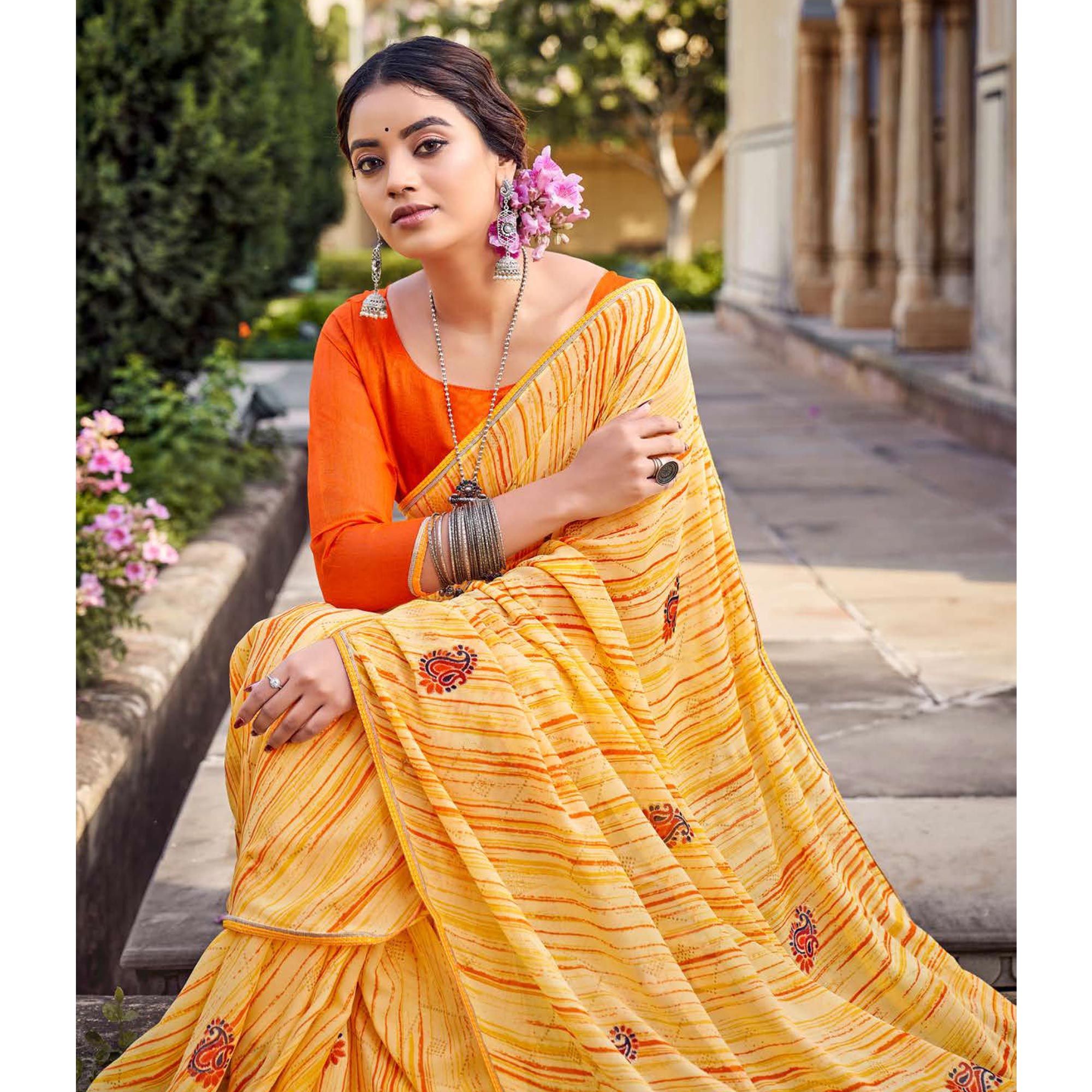 Yellow Printed Raw Silk Saree With Fancy Border