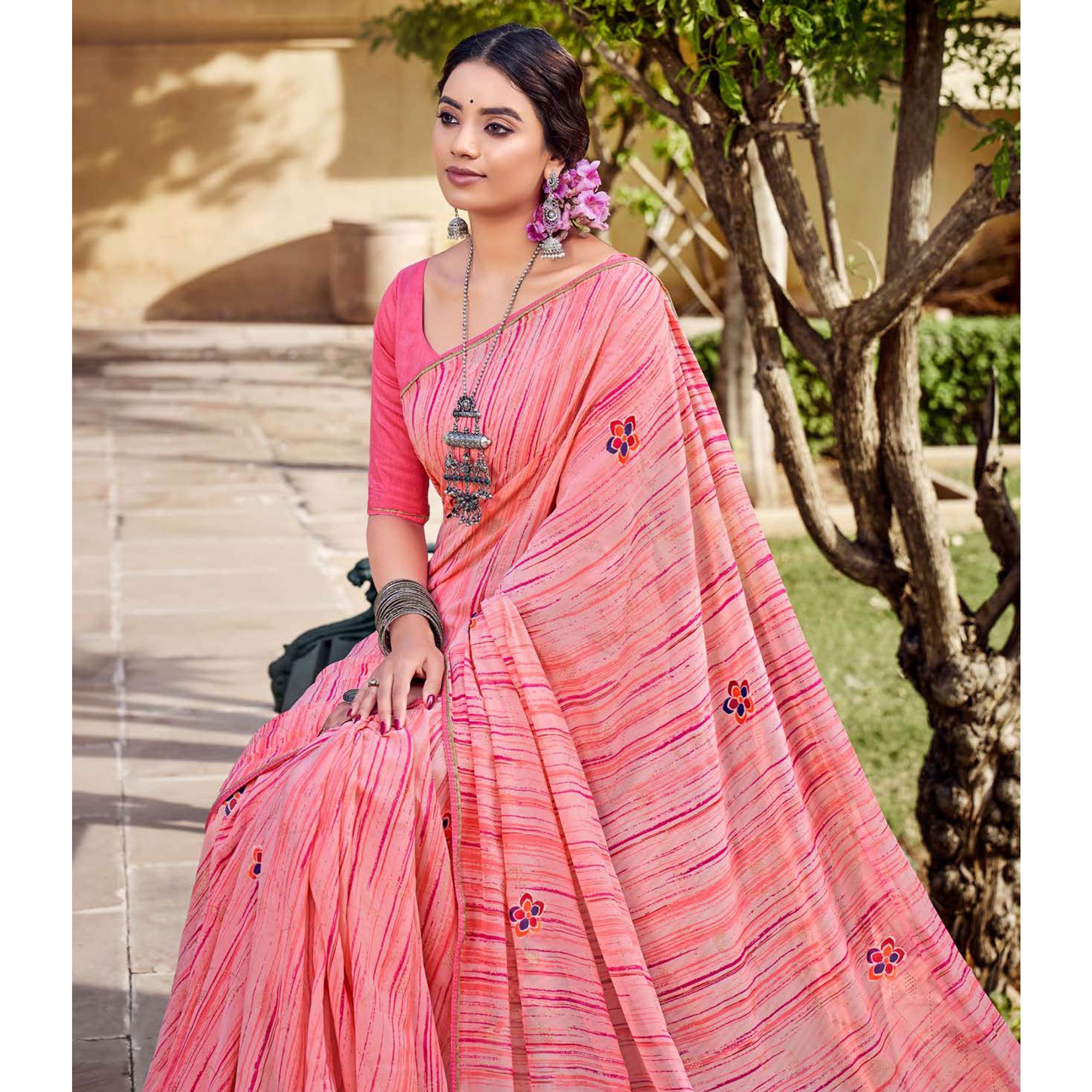 Peach Printed Raw Silk Saree With Fancy Border