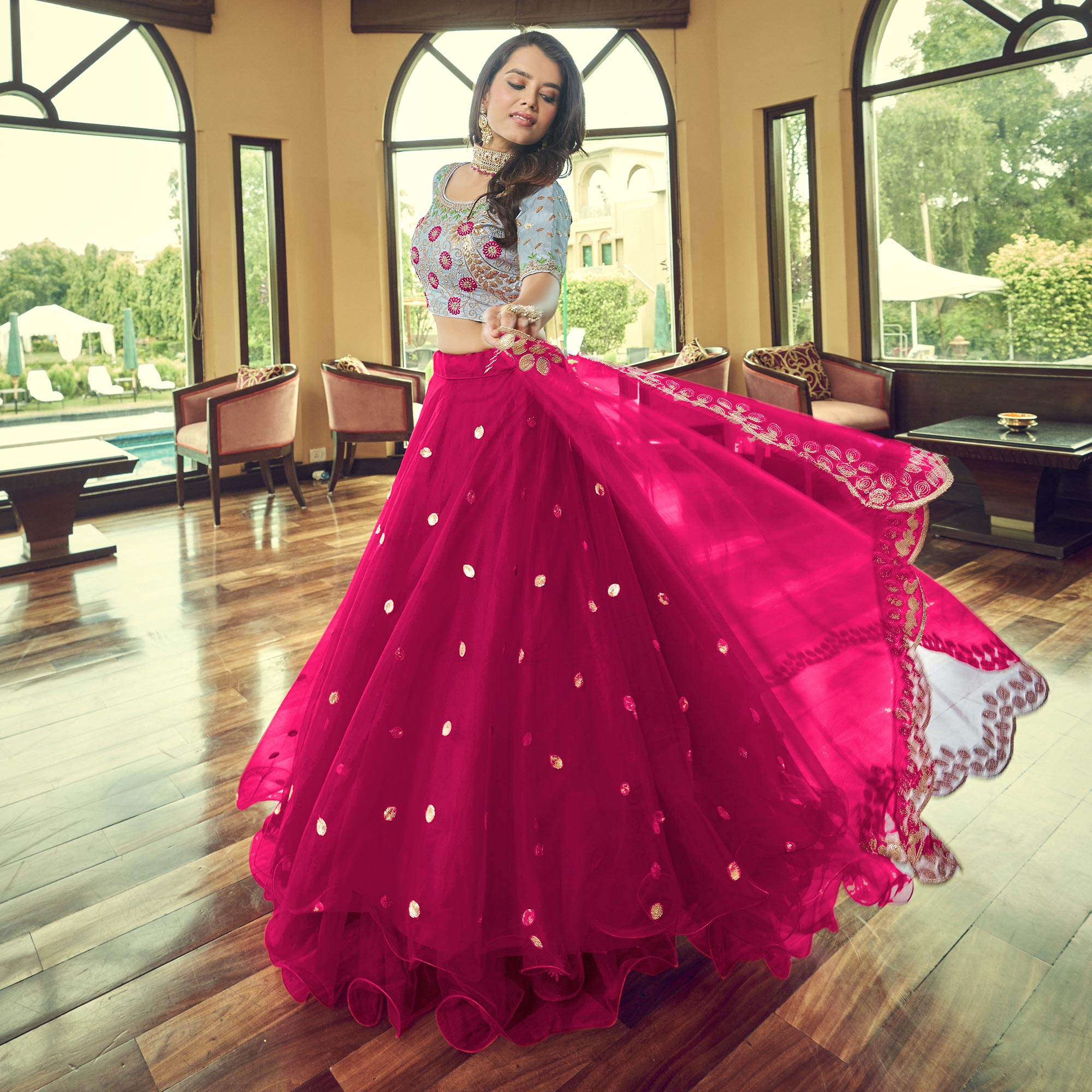 Dark Pink Sequins Embroidered Netted Lehenga Choli