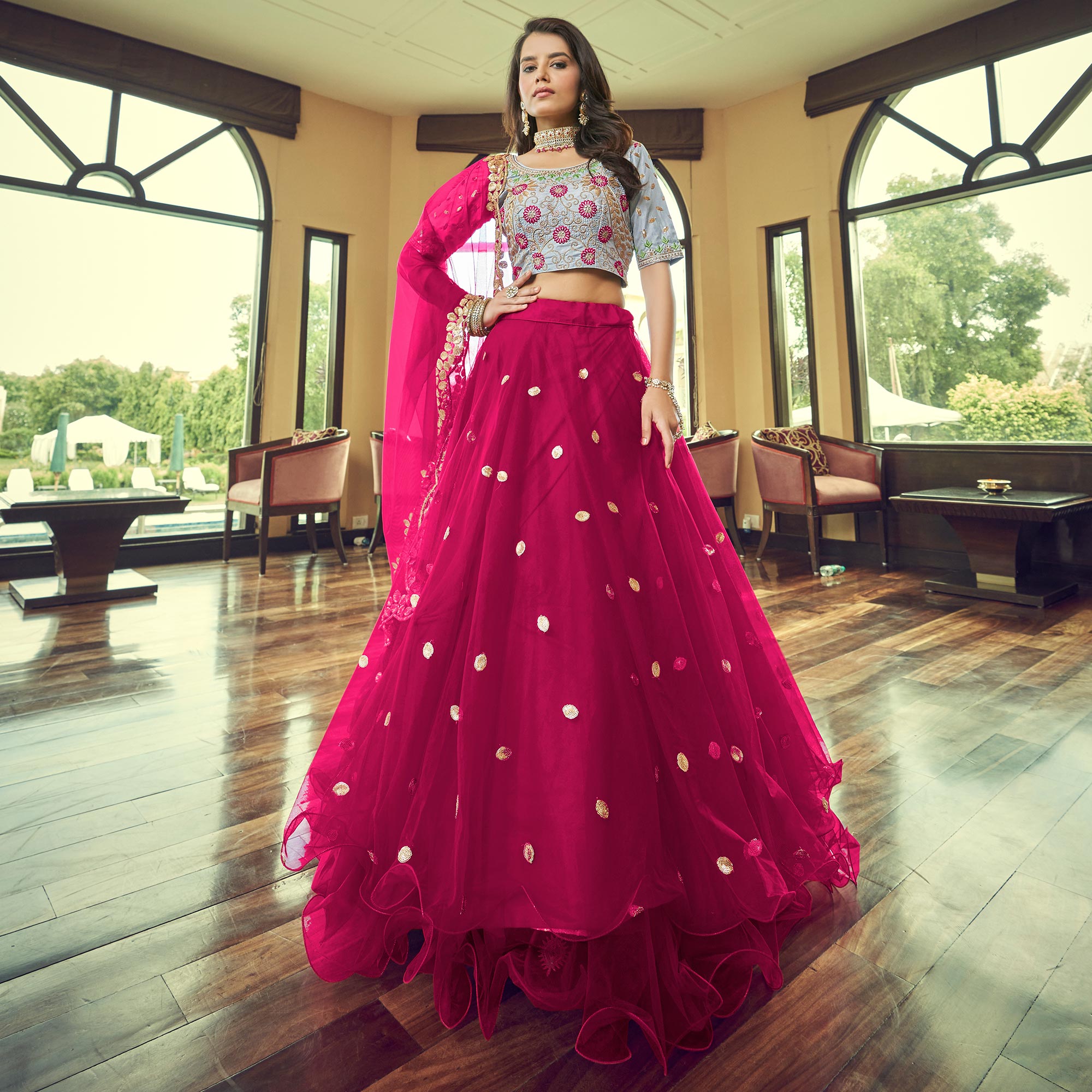Dark Pink Sequins Embroidered Netted Lehenga Choli