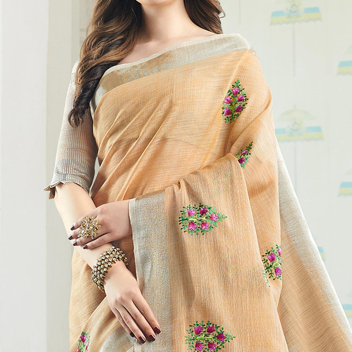 Adorable Light Peach Colored Casual Wear Floral Embroidered Linen-Cotton Saree With Tassels - Peachmode
