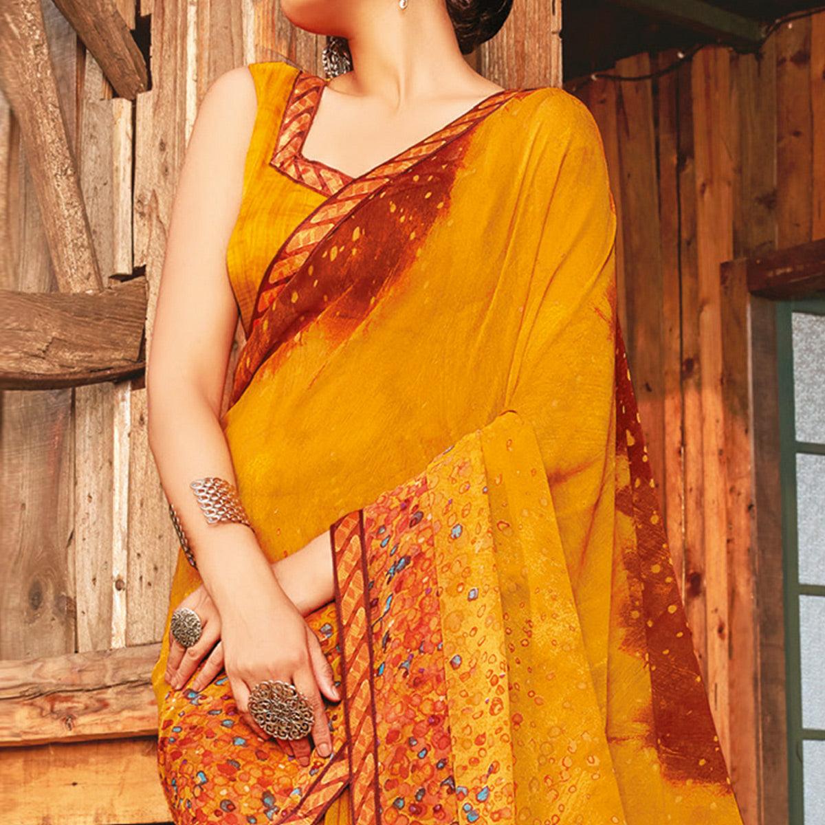 Adorable Mustard Coloured Partywear Pure Georgette Floral Printed Saree With Fancy Lace Border - Peachmode
