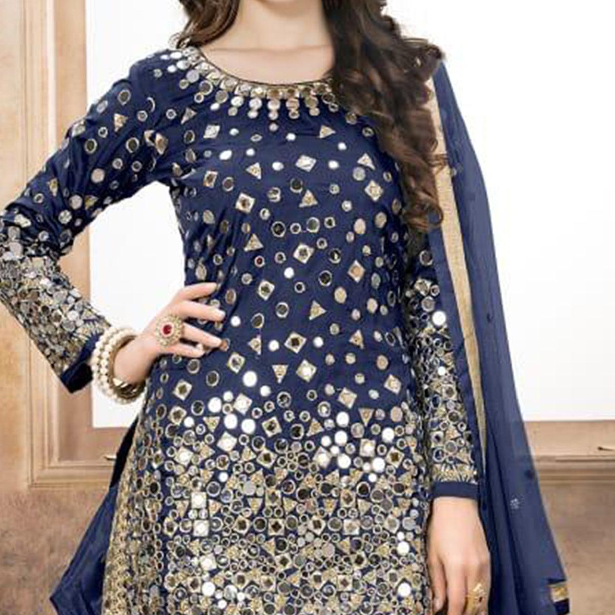 Adorning Navy Blue Colored Partywear Embroidered Tapeta Silk Patiala Suit - Peachmode