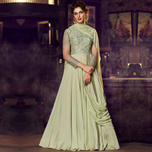 Adorning Pista Green Colored Partywear Embroidered Modal Satin Gown With Dupatta - Peachmode