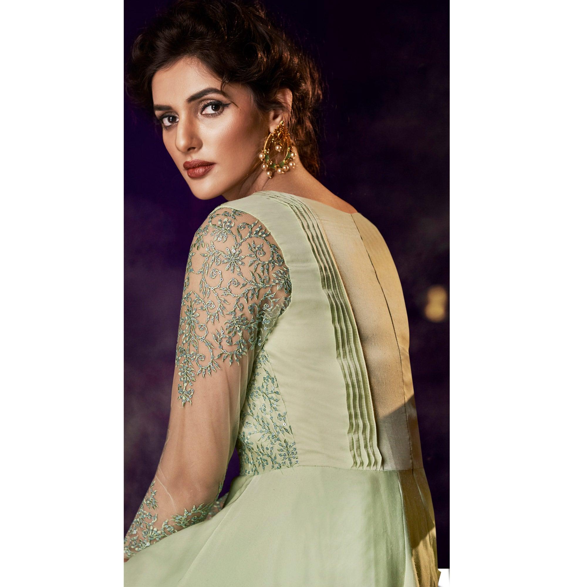 Adorning Pista Green Colored Partywear Embroidered Modal Satin Gown With Dupatta - Peachmode