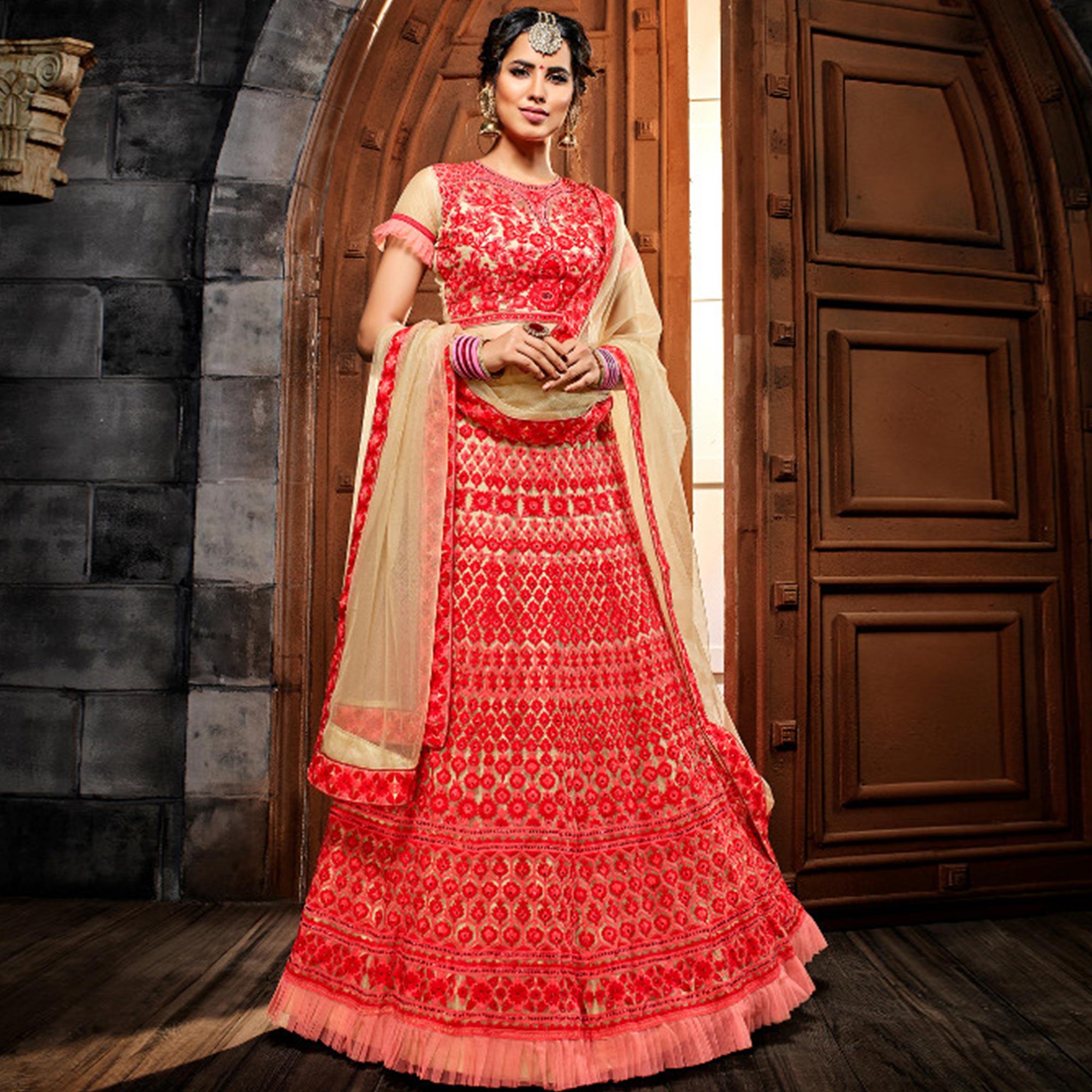 Adorning Red Colored Party Wear Embroidered Net Lehenga Choli - Peachmode