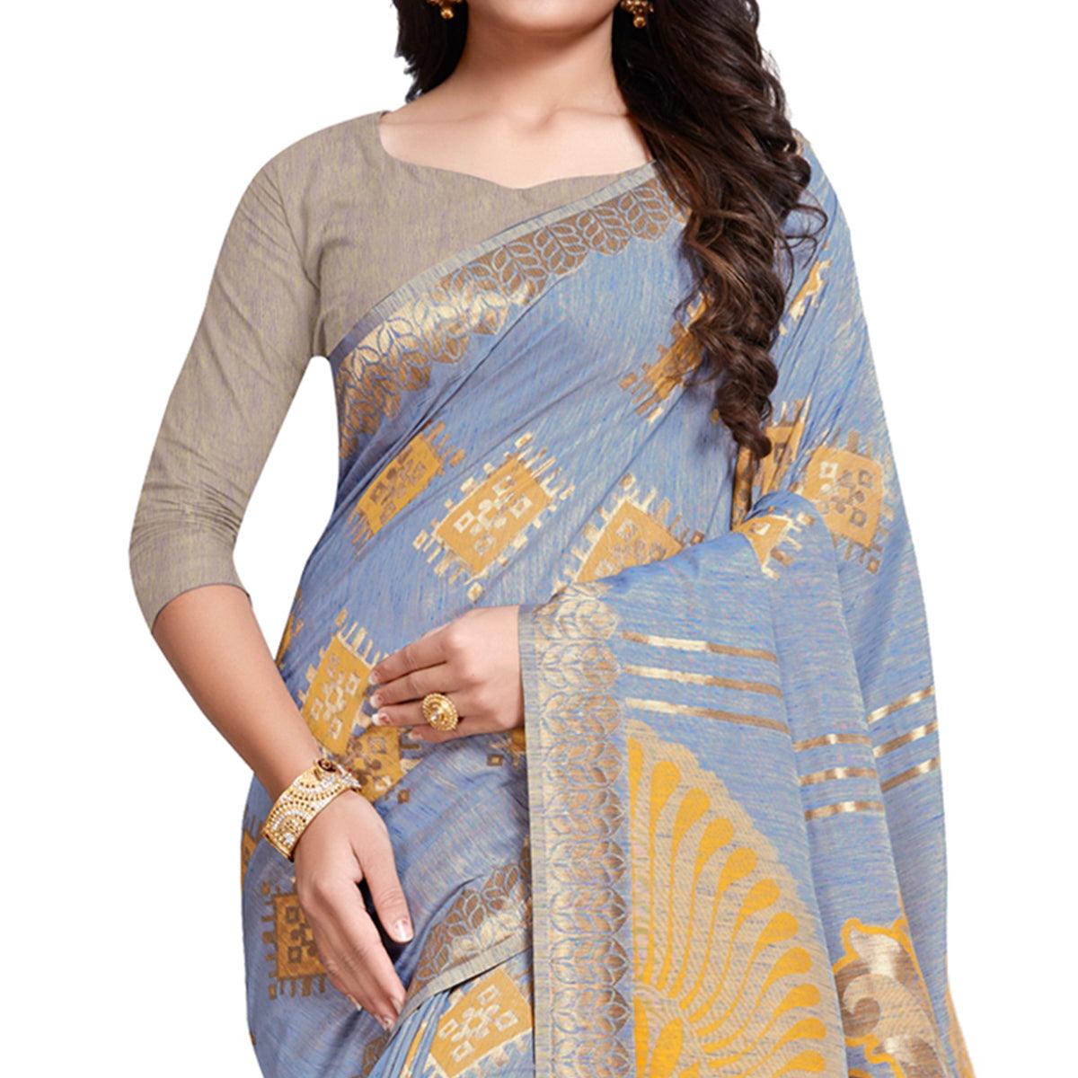 Adorning Stone Blue Colored Festive Wear Woven Silk Blend Saree With Tassles - Peachmode