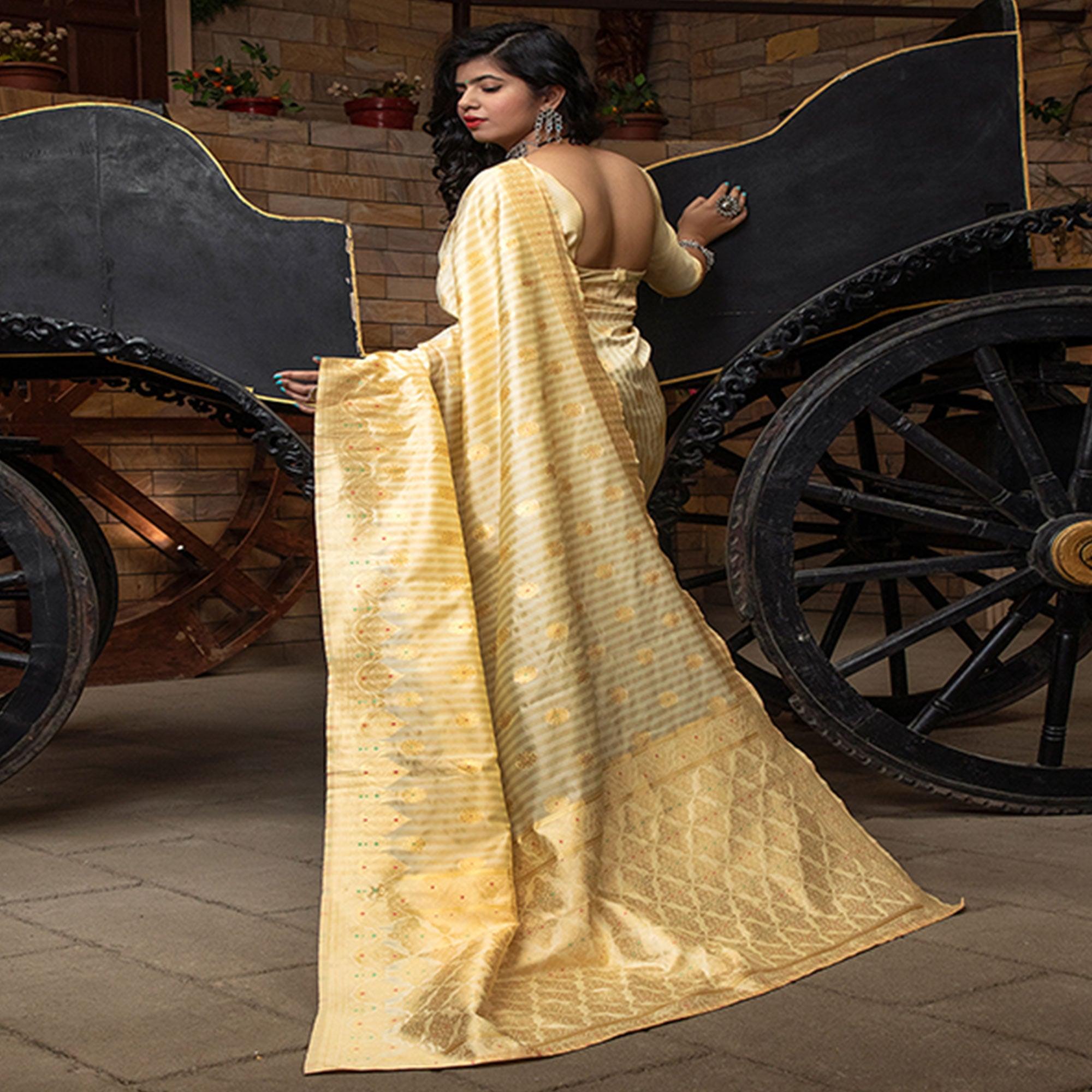 Alluring Cream Colored Festive Wear Woven Banarasi Silk Saree - Peachmode