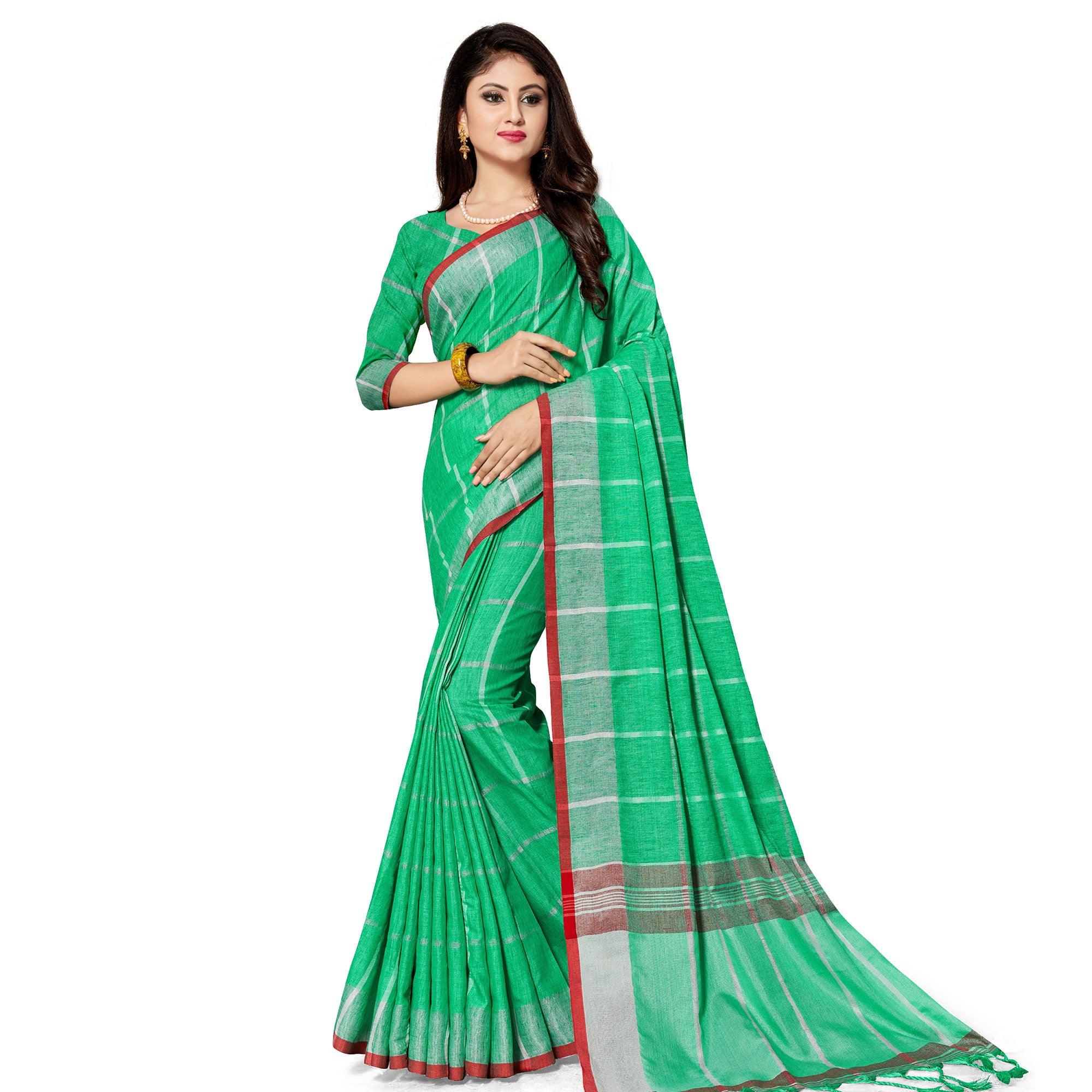 Alluring Green Colored Fesive Wear Stripe Print Cotton Silk Saree With Tassels - Peachmode