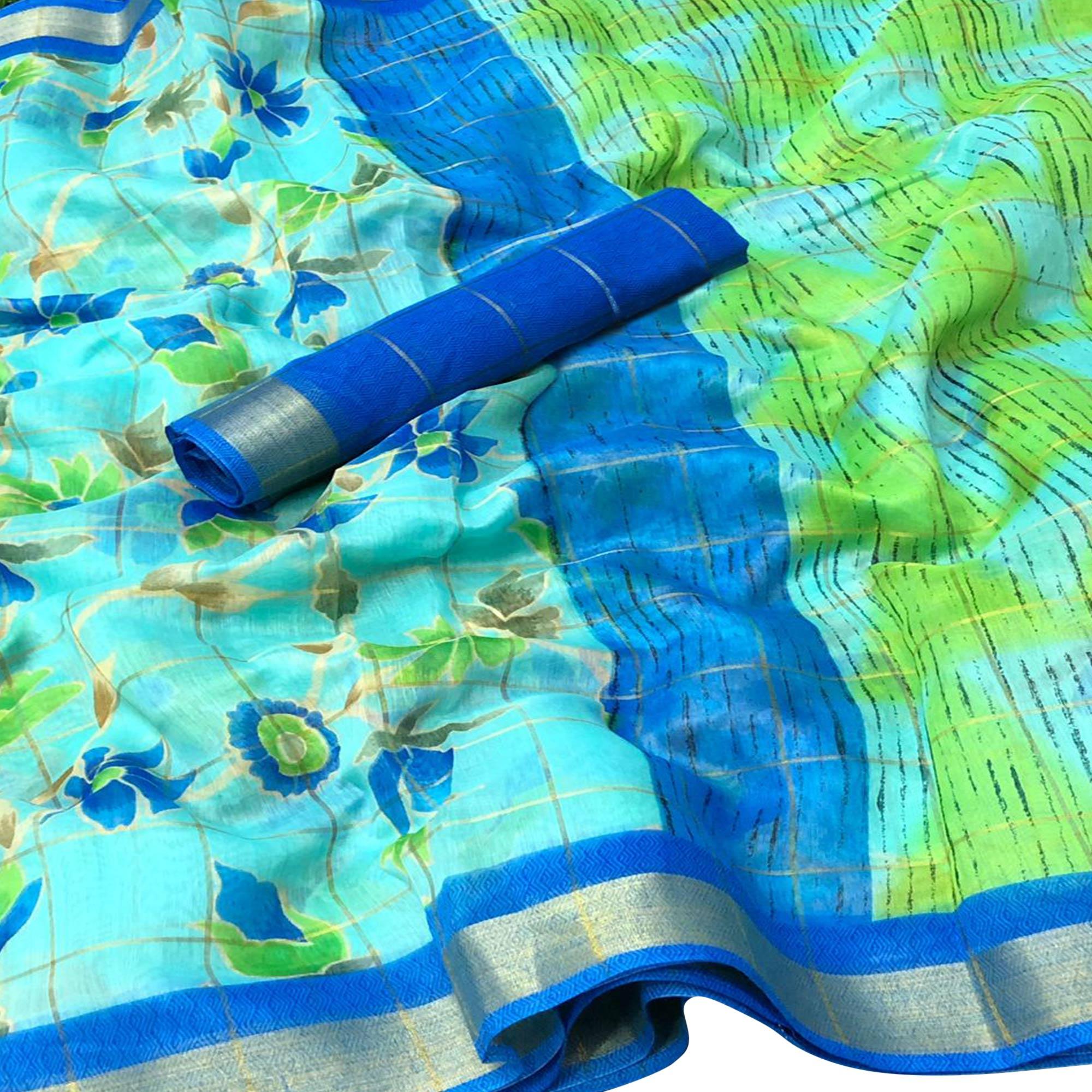 Amazing Aqua Blue Colored Casual Floral Printed Cotton Saree - Peachmode