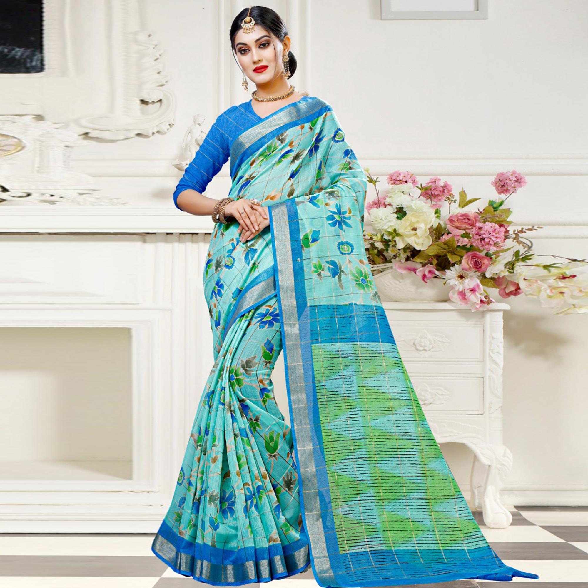 Amazing Aqua Blue Colored Casual Floral Printed Cotton Saree - Peachmode
