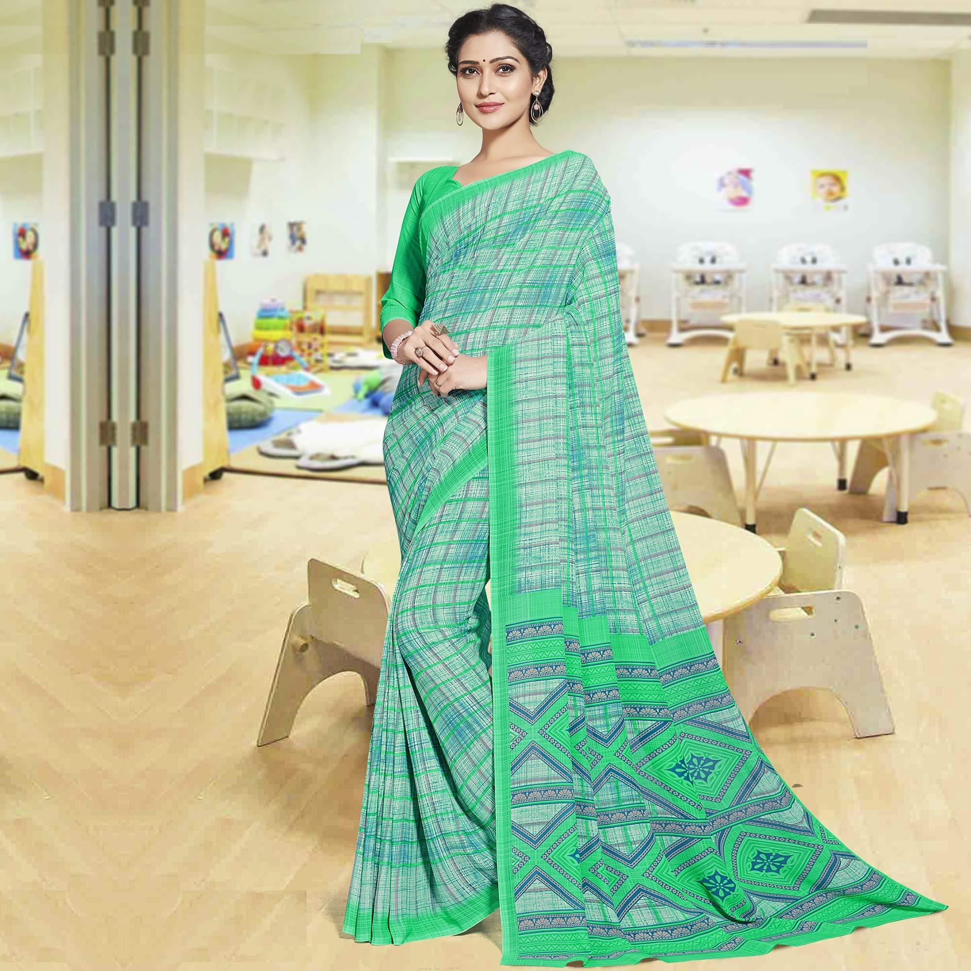 Amazing Aqua Green Colored Casual Printed Georgette Saree - Peachmode