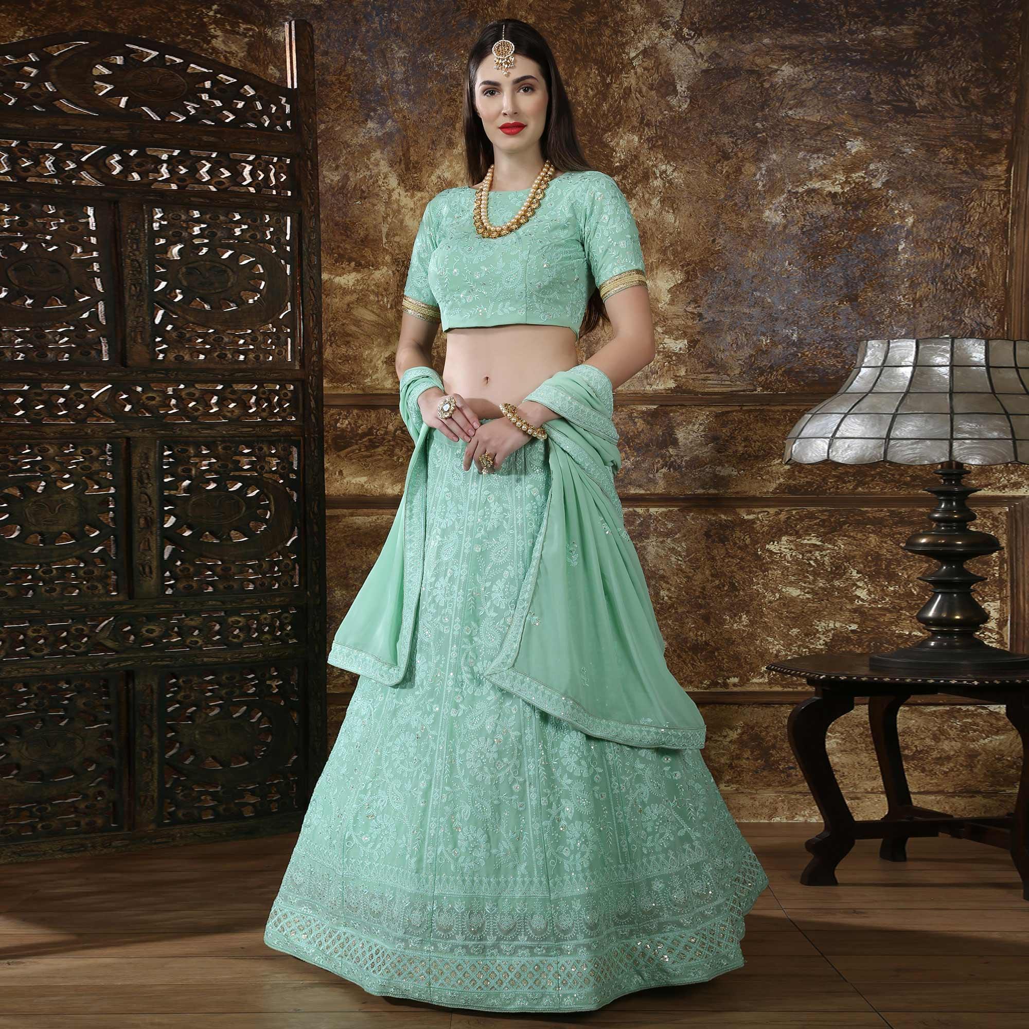 Amazing Mint Green Colored Partywear Embroidered Gerogette Lehenga Choli - Peachmode