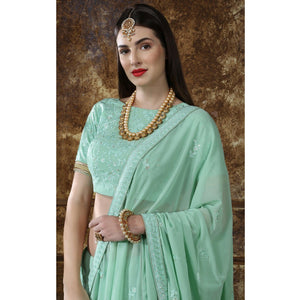Amazing Mint Green Colored Partywear Embroidered Gerogette Lehenga Choli - Peachmode