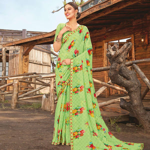 Amazing Pista Coloured Partywear Pure Georgette Floral Printed Saree With Fancy Lace Border - Peachmode