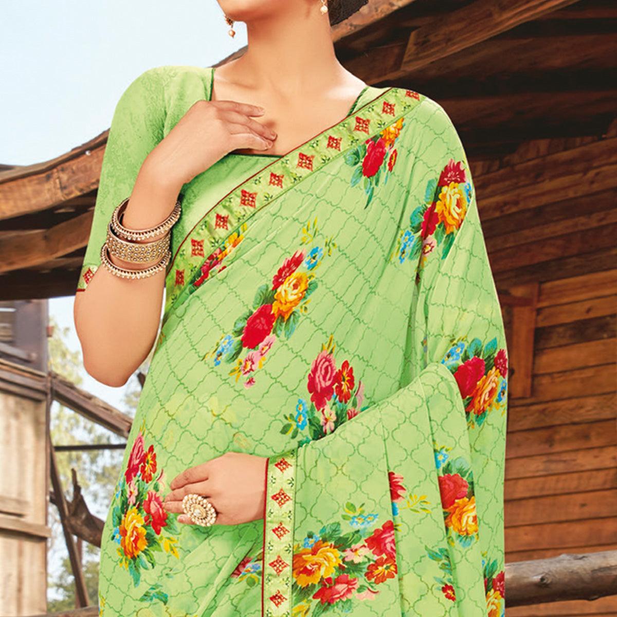 Amazing Pista Coloured Partywear Pure Georgette Floral Printed Saree With Fancy Lace Border - Peachmode