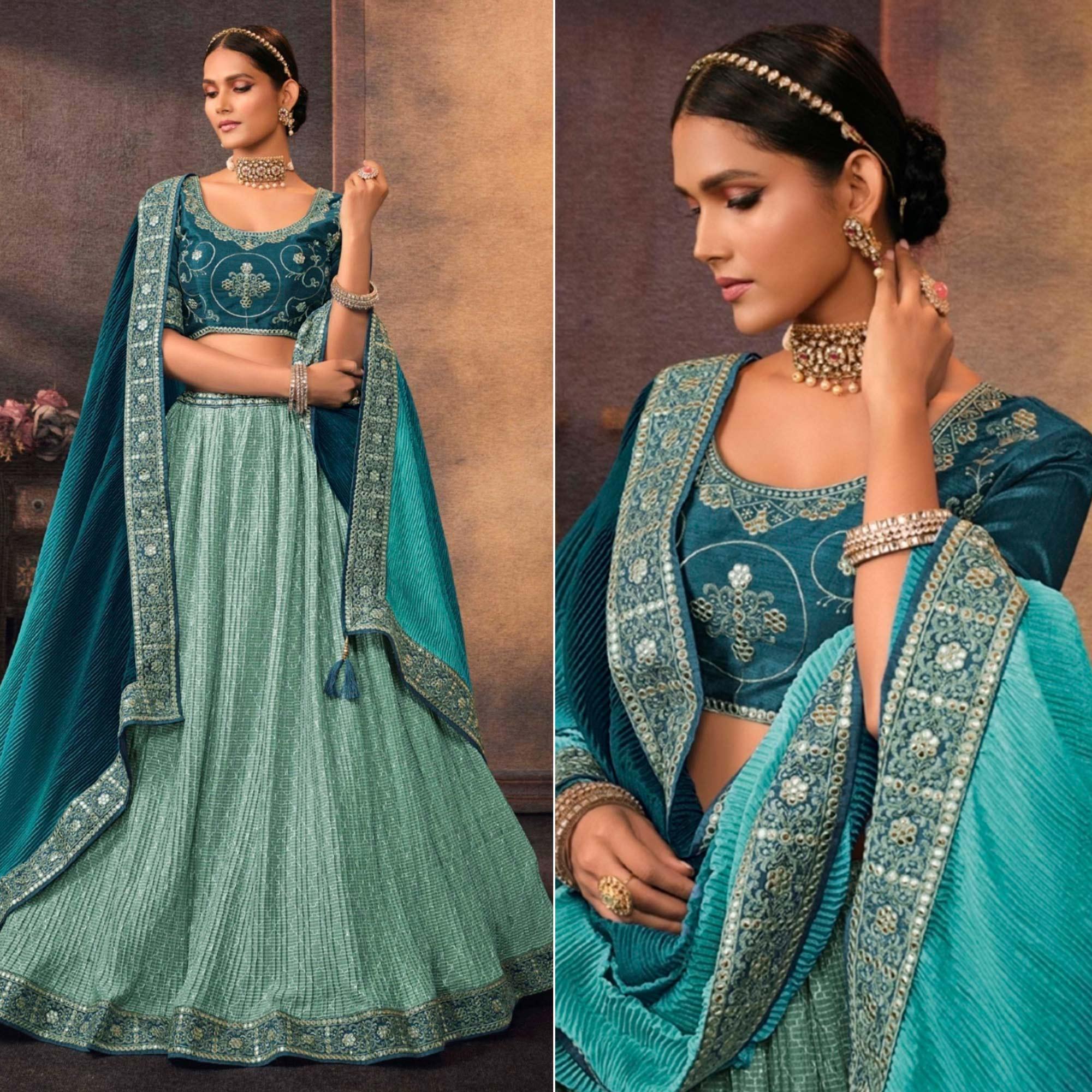 Aqua Blue Embroidered Chiffon Lehenga Choli - Peachmode