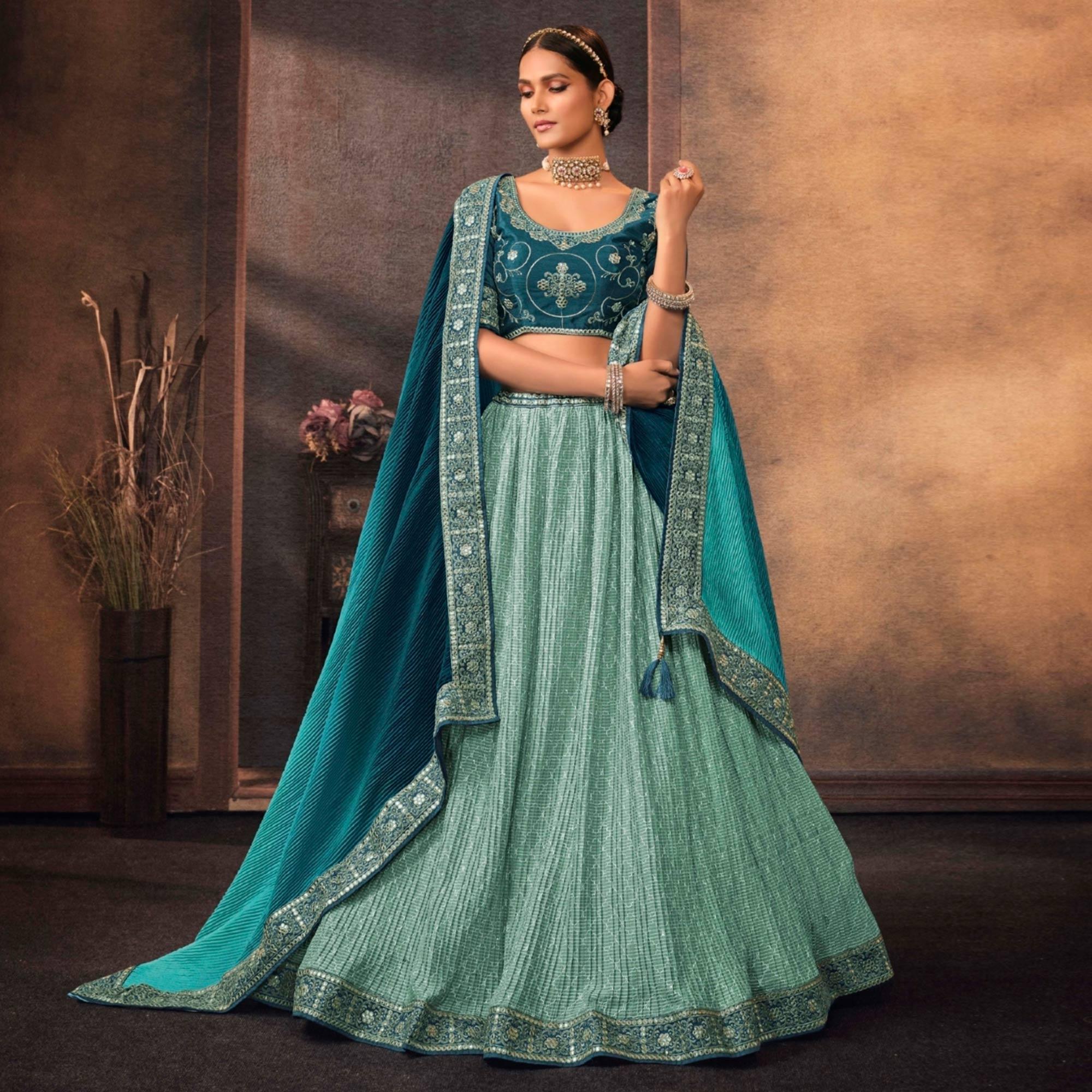 Aqua Blue Embroidered Chiffon Lehenga Choli - Peachmode