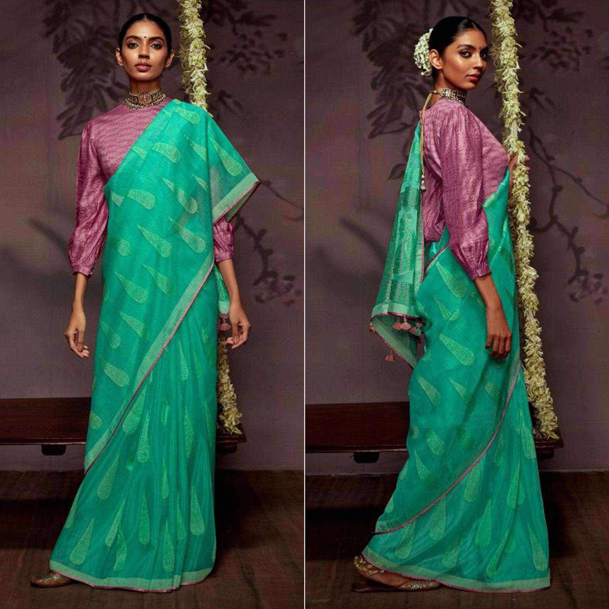 Aqua Blue Woven Brasso Saree With Tassels - Peachmode