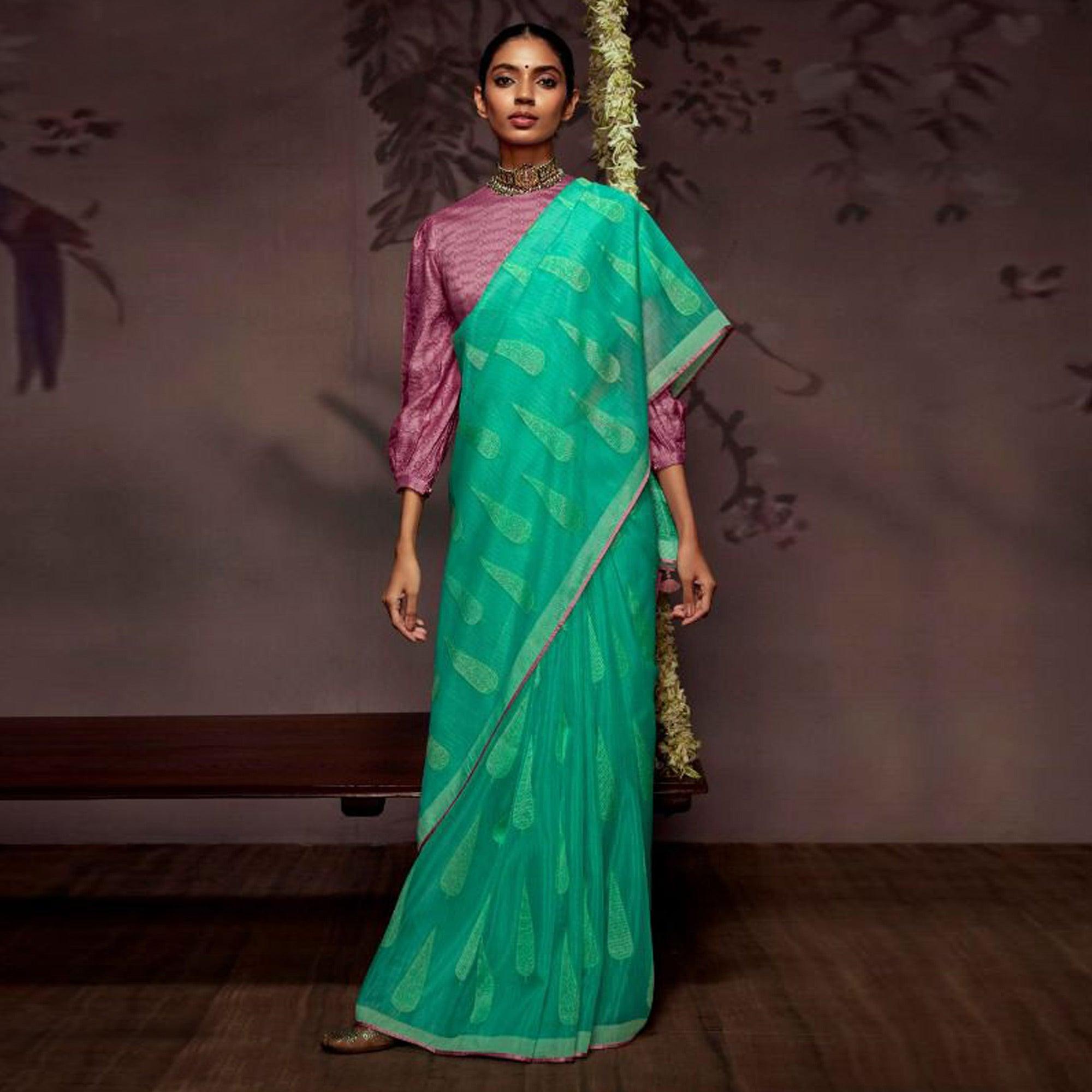 Aqua Blue Woven Brasso Saree With Tassels - Peachmode