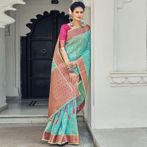 Aqua Blue Woven Organza Saree With Tassels - Peachmode