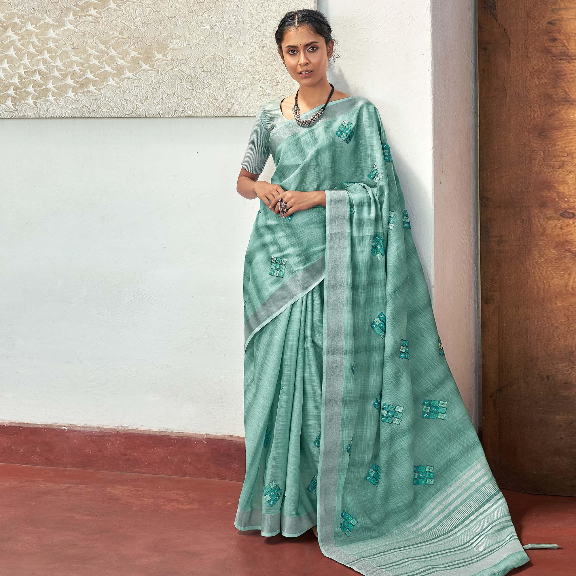 Aqua Green Casual Wear Embroidered Linen Saree With Tassels - Peachmode