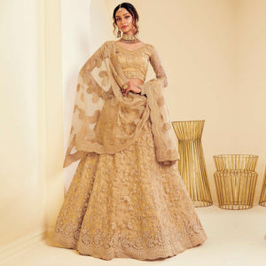 Arresting Golden Coloured Wedding Wear Cording Embroidered Net Lehenga Choli - Peachmode