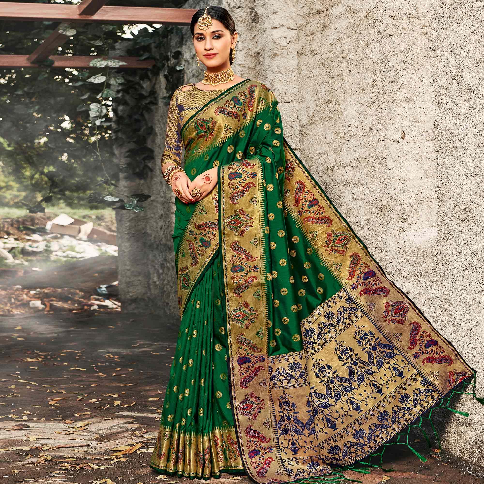 Arresting Green Colored Festive Wear Woven Banarasi Silk Saree With Tassels - Peachmode