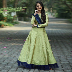 Arresting Green Colored Partywear Tapetta Gown - Peachmode