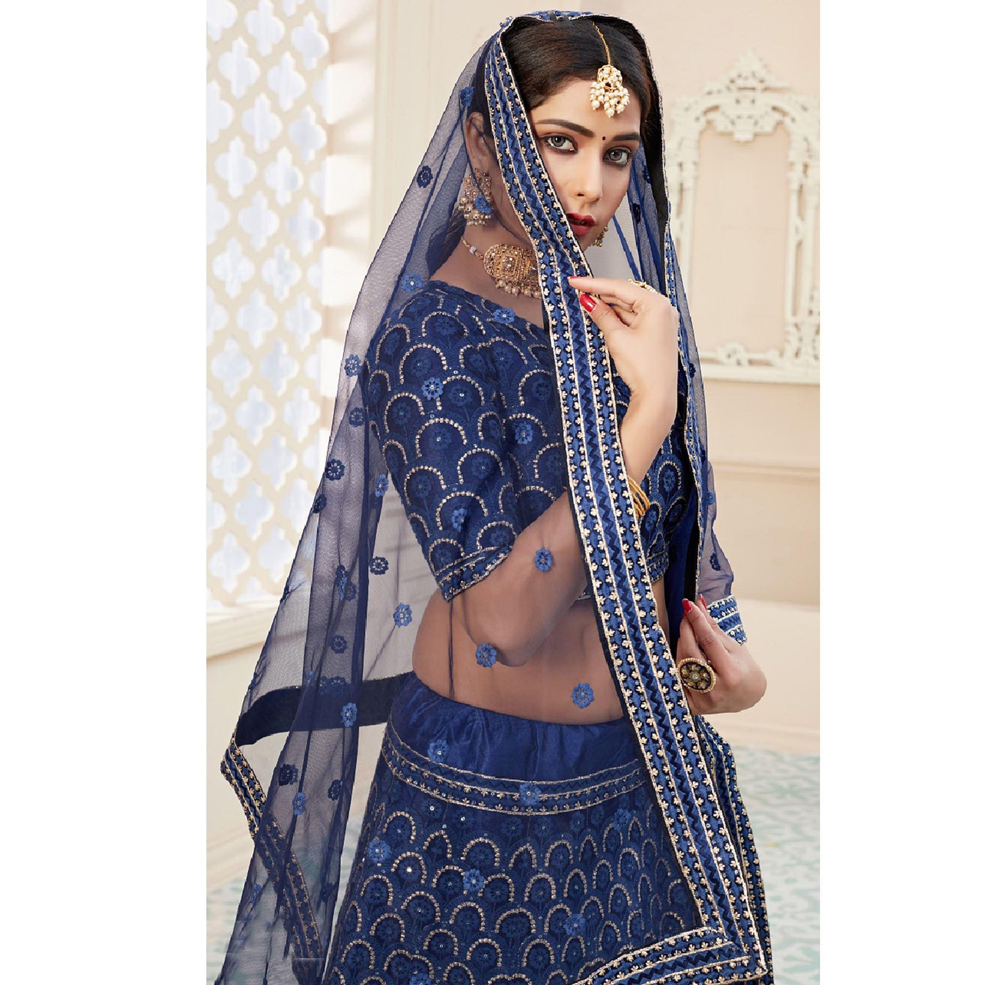 Arresting Navy Blue Coloured Thread Embroidery Heavy Net Lehenga Choli - Peachmode