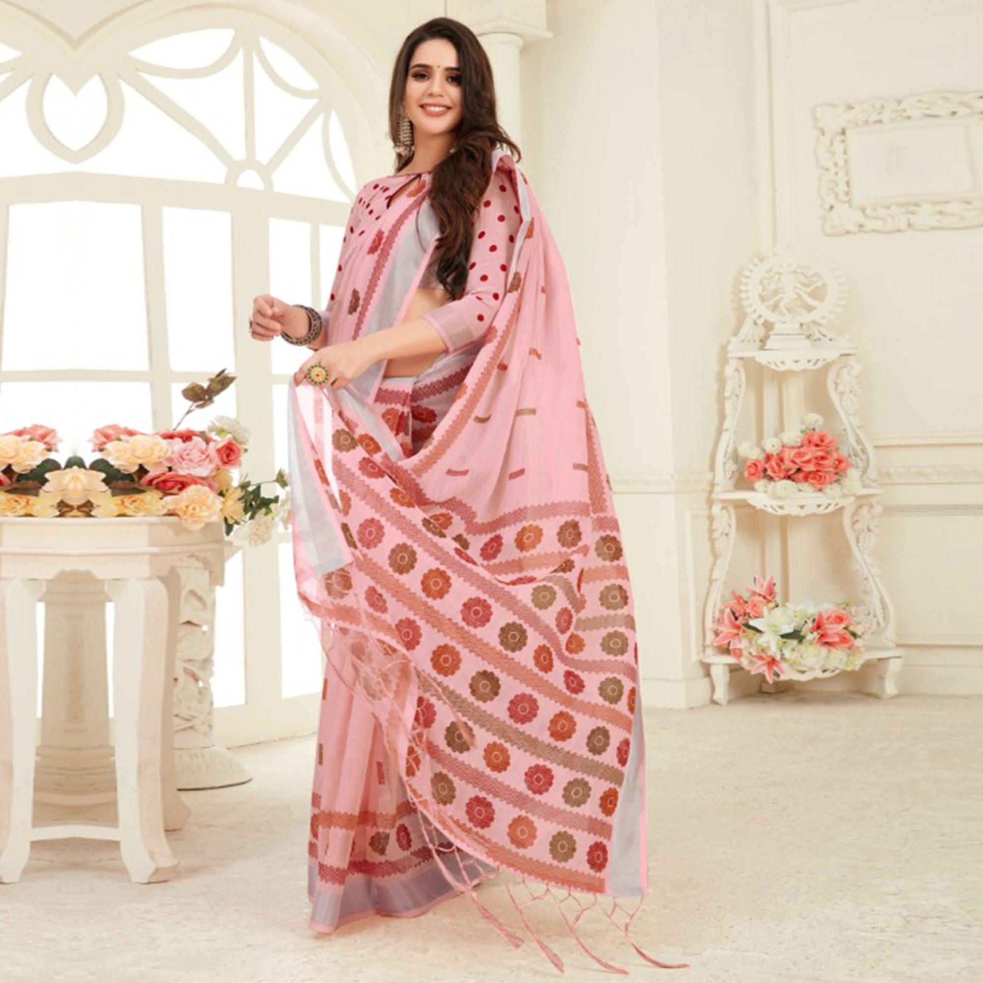 Arresting Peach Colored Casual Printed Linen Saree With Tassels - Peachmode