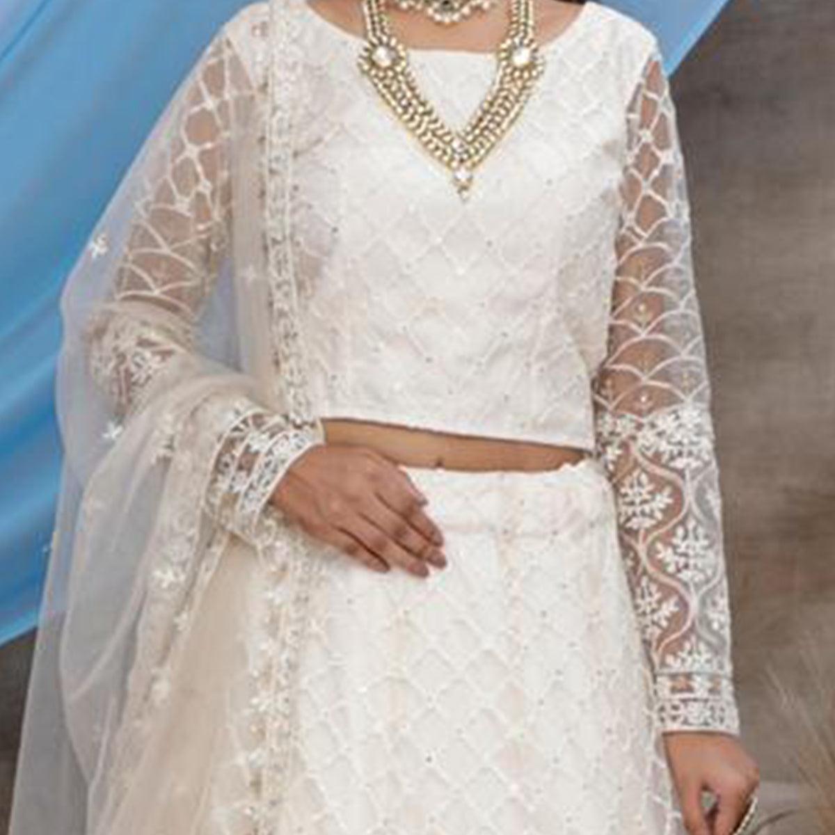 Arresting White Colored Party Wear Embroidered Net Lehenga Choli - Peachmode