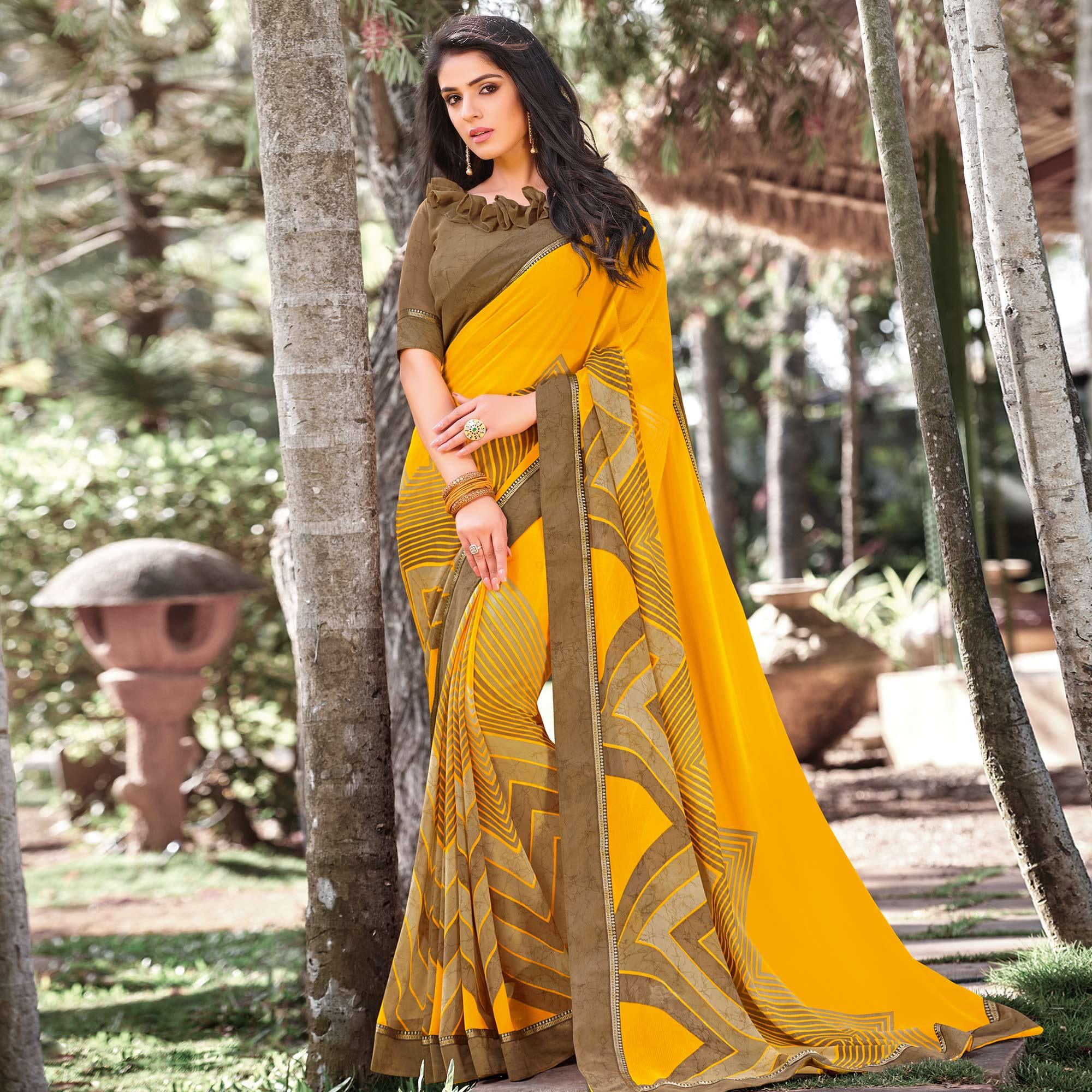 Arresting Yellow Colored Partywear Printed Georgette Saree - Peachmode