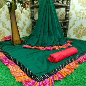 Attractive Bottle Green Colored Partywear Solid Vichitra Silk Saree With Bandhani Print Ruffle - Peachmode