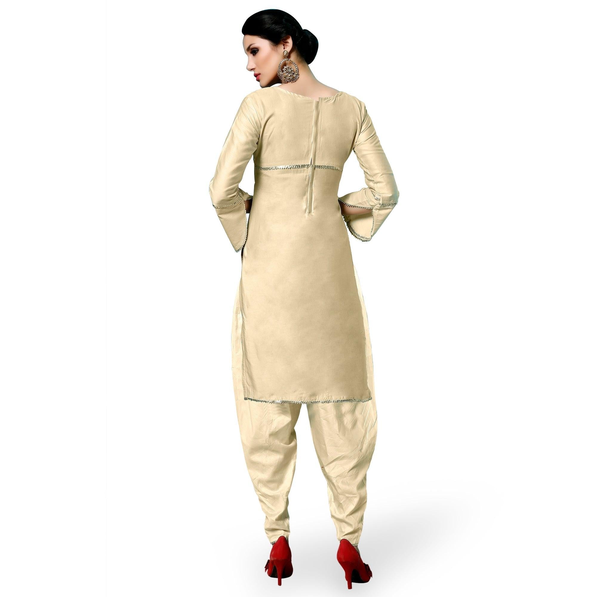 Attractive Cream Colored Partywear Embroidered Cotton Dress Material - Peachmode