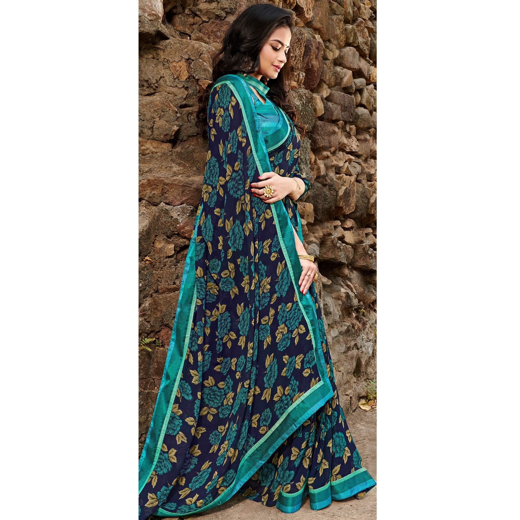 Attractive Navy Blue Colored Casual Floral Printed Georgette Saree - Peachmode