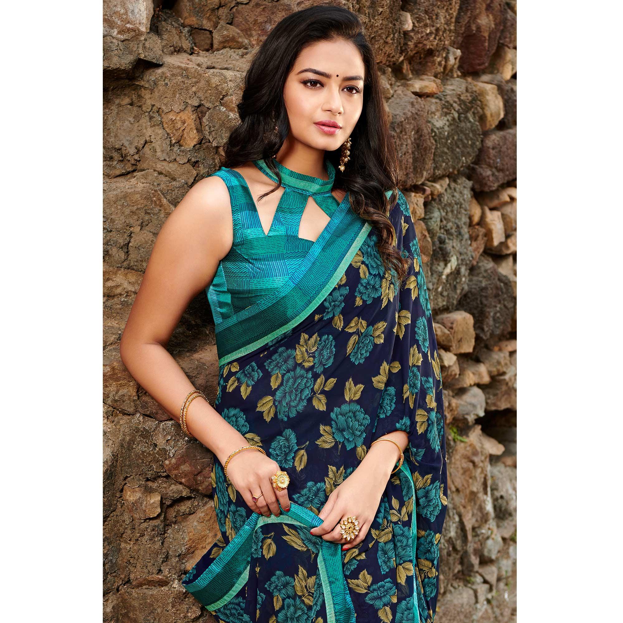 Attractive Navy Blue Colored Casual Floral Printed Georgette Saree - Peachmode