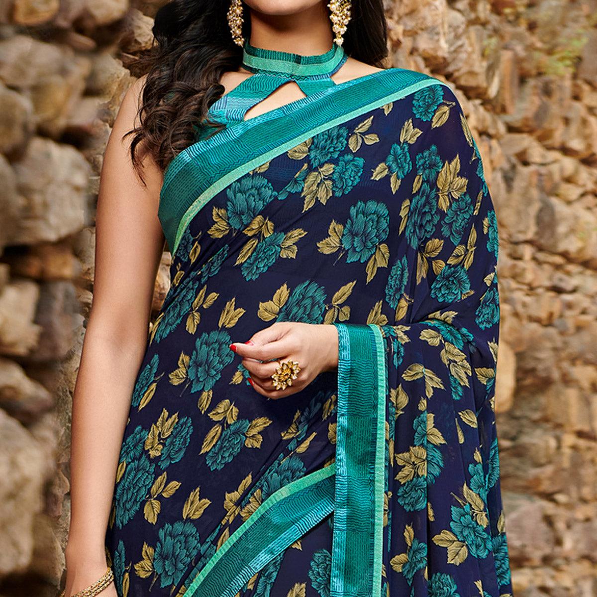 Attractive Navy Blue Colored Casual Floral Printed Georgette Saree - Peachmode