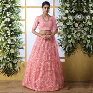 Attractive Peach Colored Party Wear Embrodiered Net Lehenga Choli - Peachmode