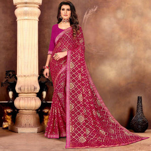 Attractive Pink Colored Festive Wear Bandhani Print With Gotta Border Heavy Georgette Saree - Peachmode