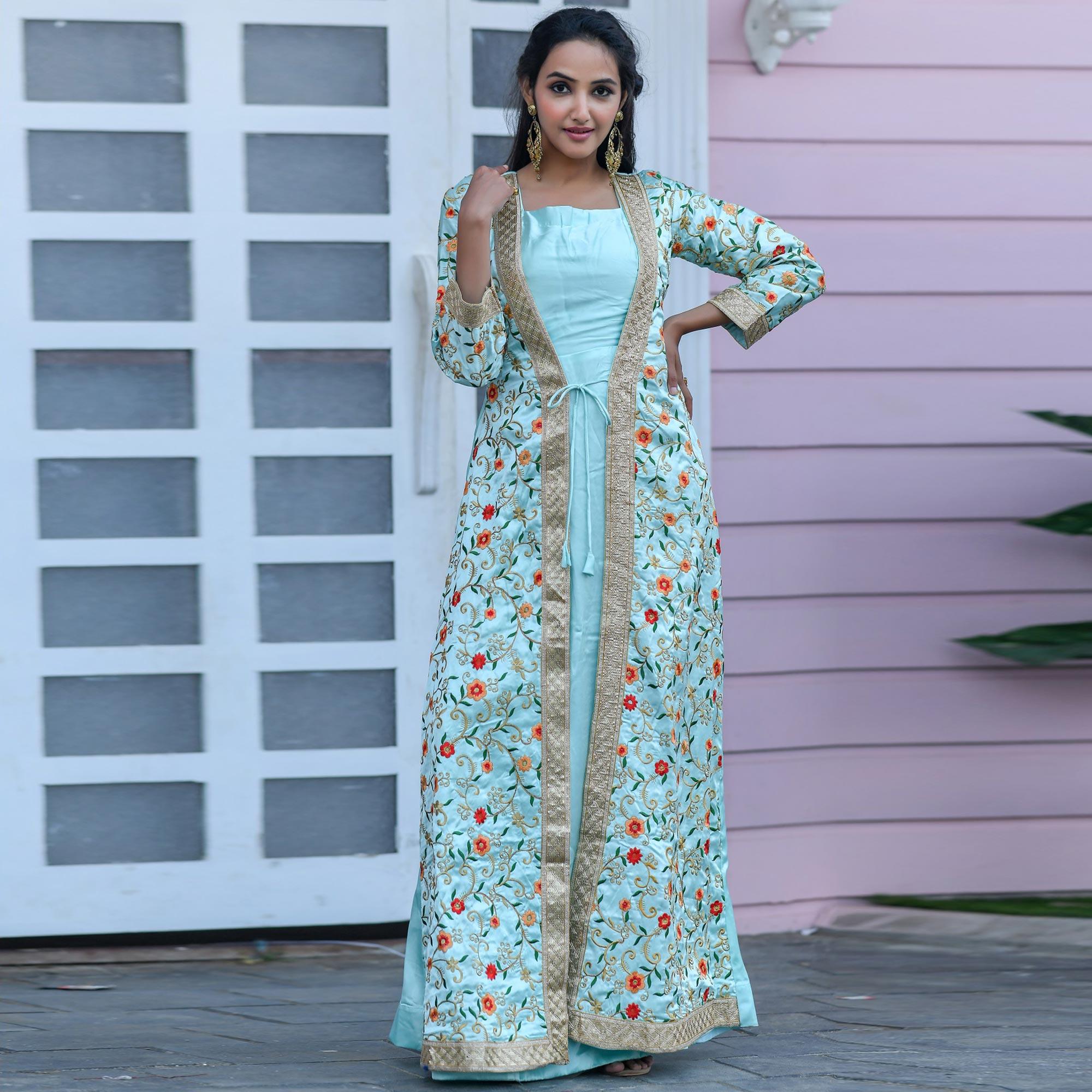 Attractive Sky Colored Partywear Embroidered Satin Gown - Peachmode
