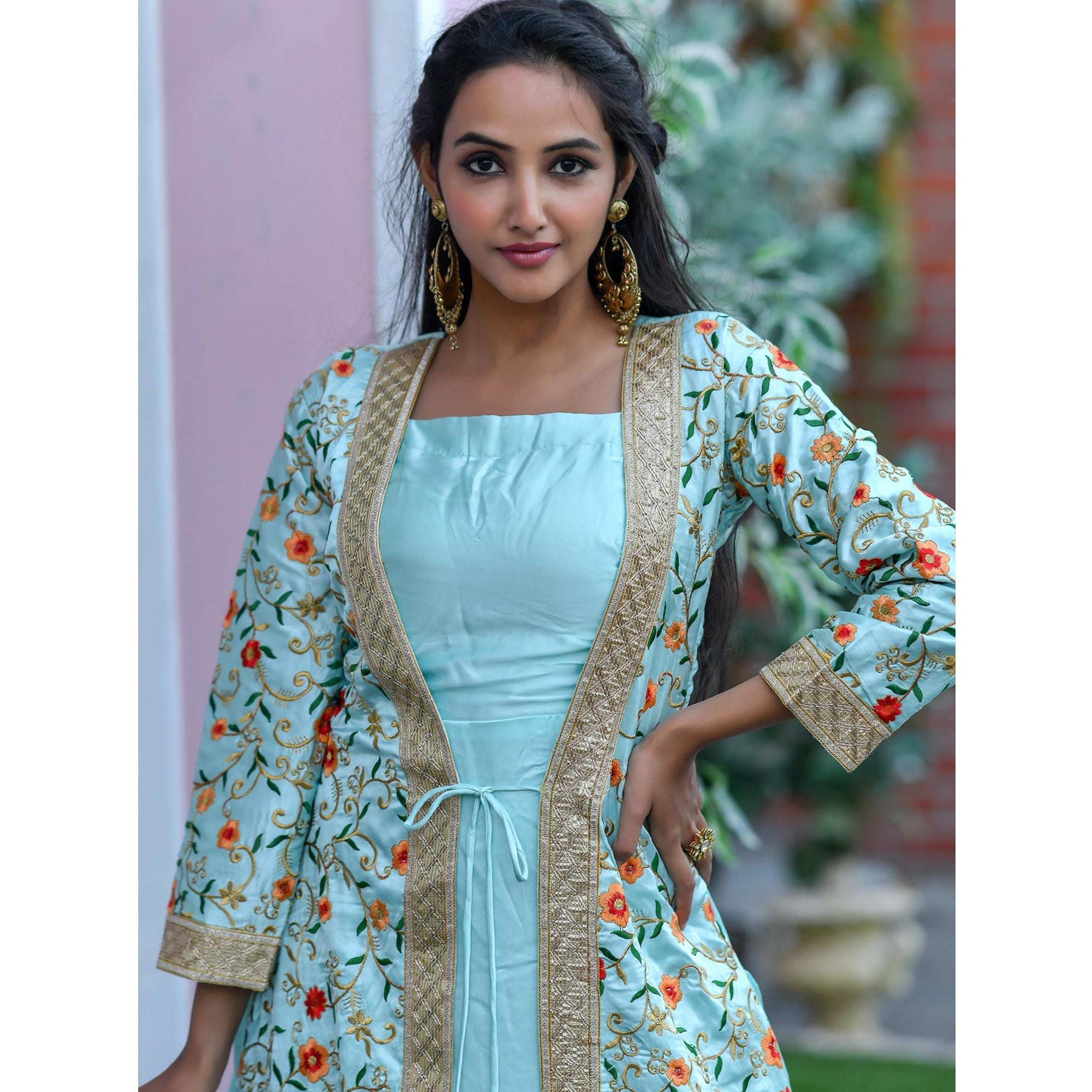 Attractive Sky Colored Partywear Embroidered Satin Gown - Peachmode