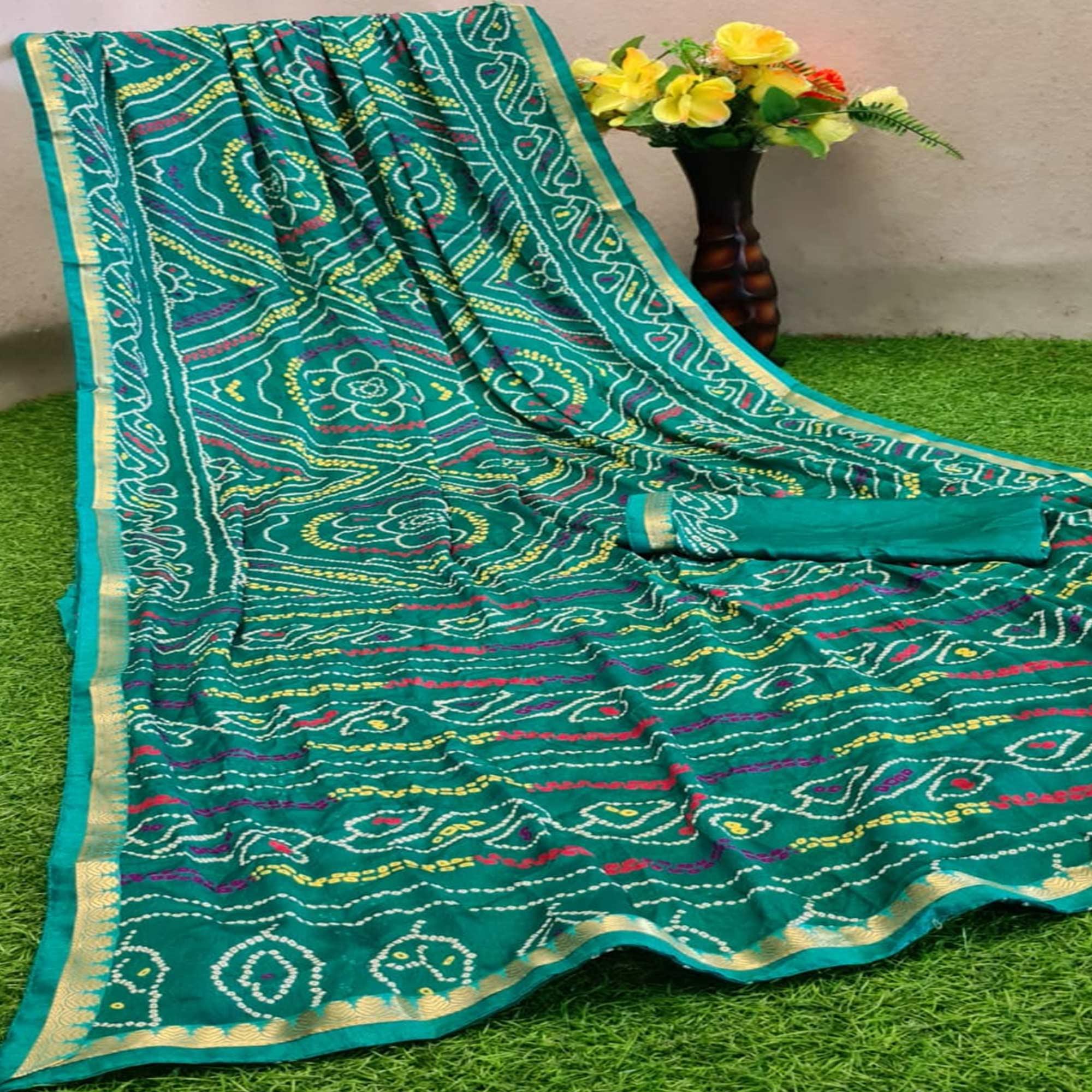Attractive Turquoise Green Colored Festive Wear Woven Moss Georgette Saree - Peachmode